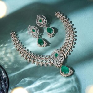 Dazzling diamond and emerald jewelry set beautifully showcased, perfect for festive occasions.